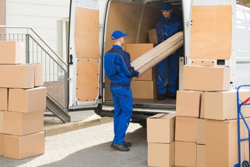 Professional team conducting house clearance in Cobham