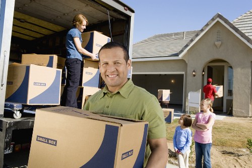 Team of professionals performing house clearance