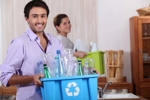 Professional workers sorting items during house clearance