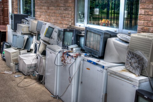 Family organizing waste for council collection